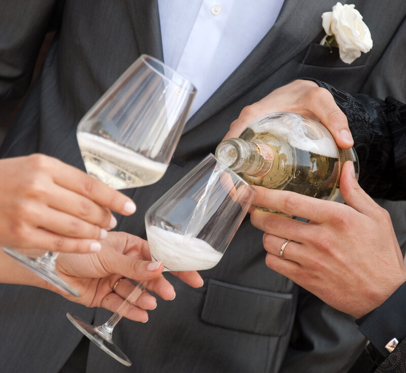 Hands Pouring Champagne