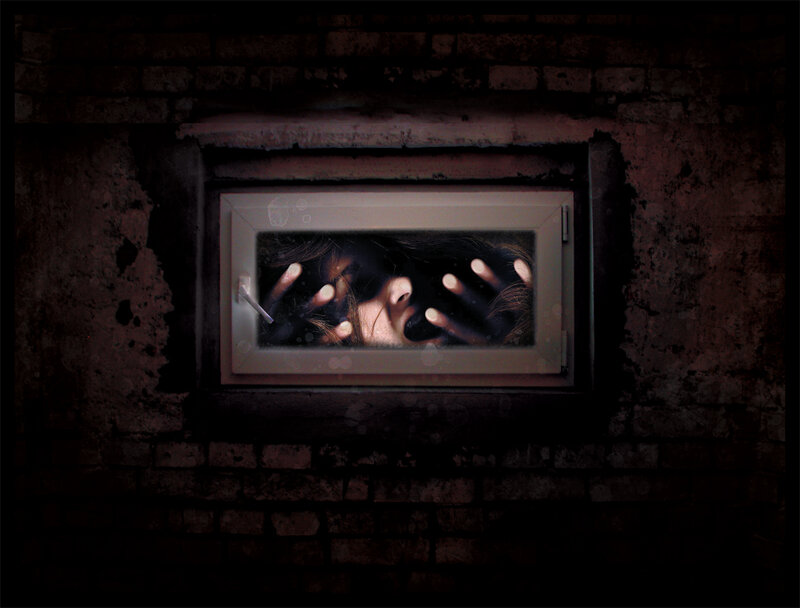 hands pressed against window