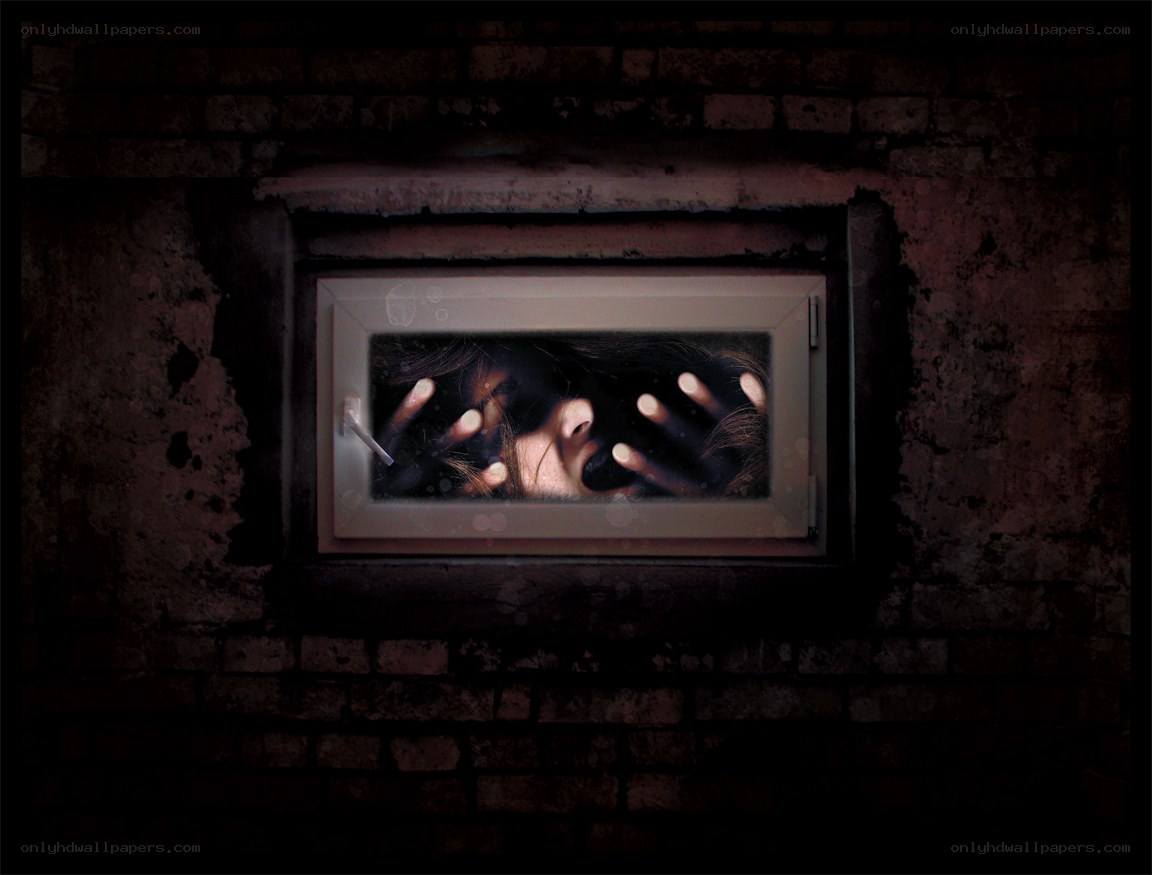 hands pressed against window