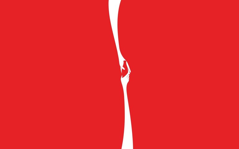 hands reaching across red background