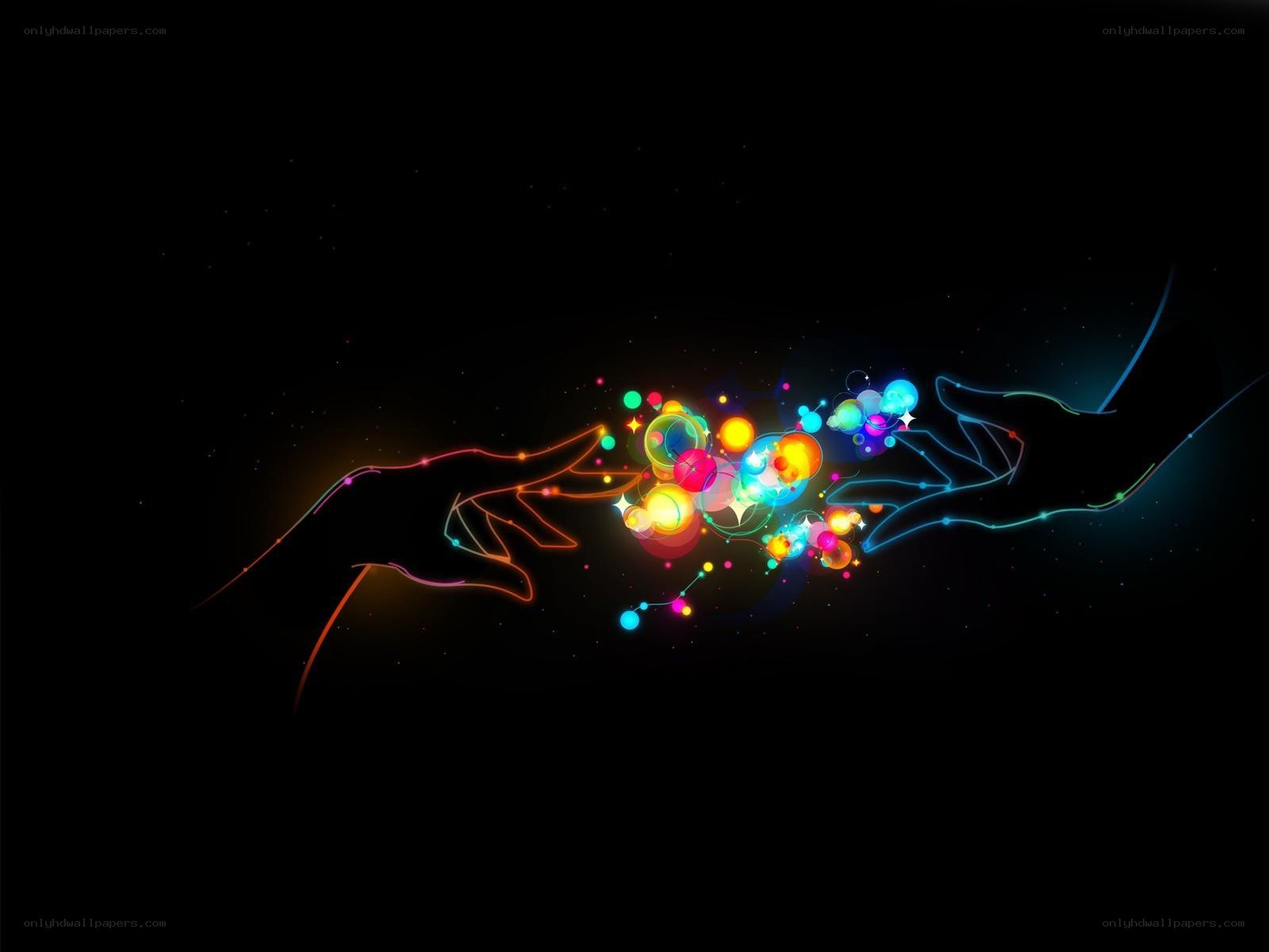 hands reaching for colorful light