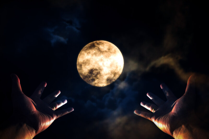 Hands Reaching for Moon