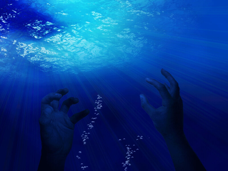 hands reaching for sunlight underwater