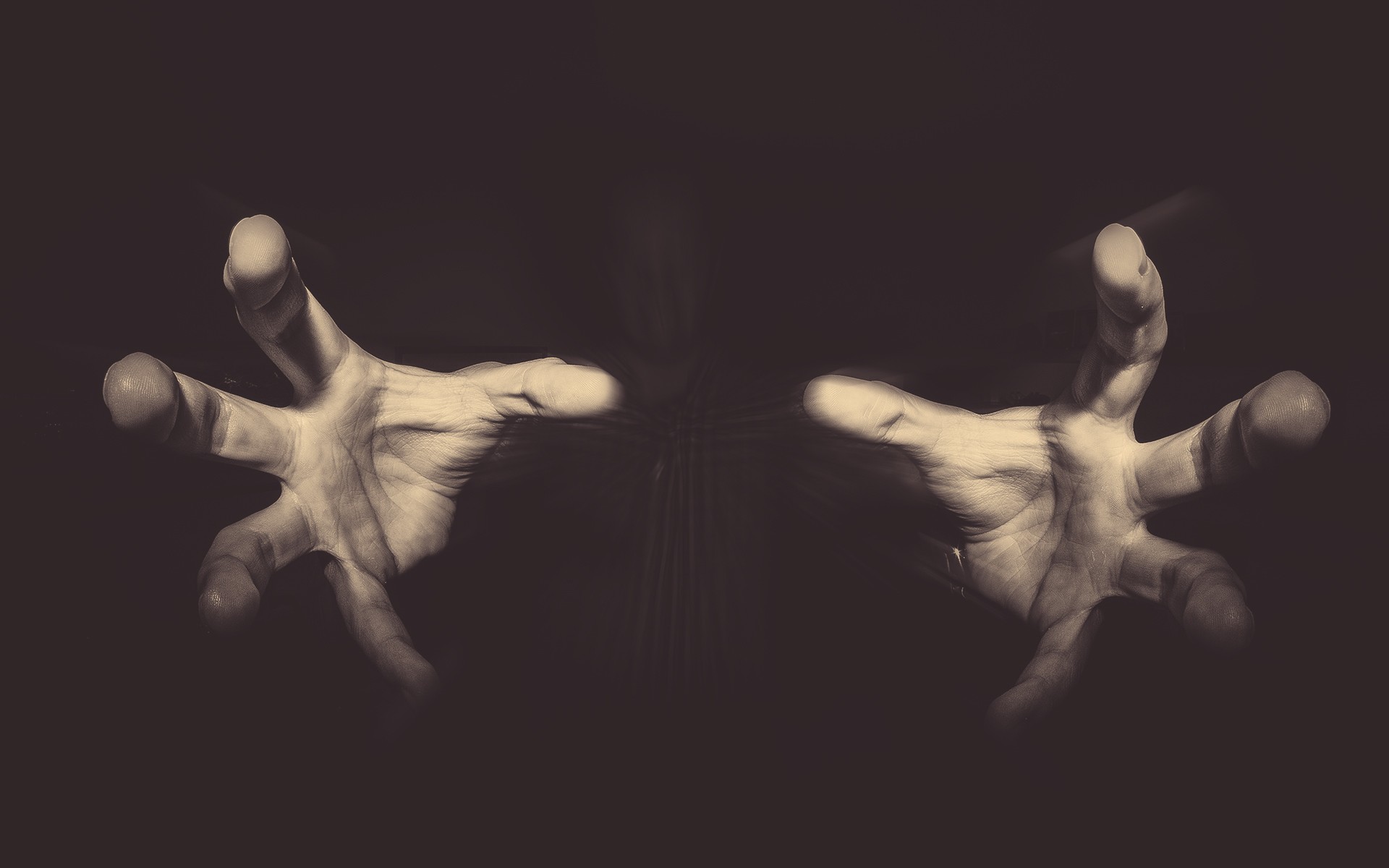 hands reaching forward