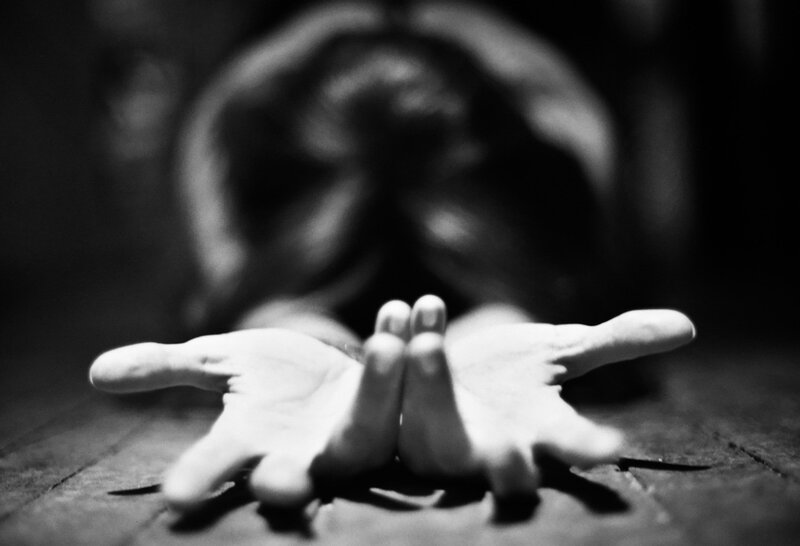 hands reaching forward