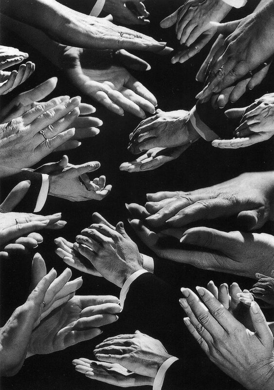 Hands reaching in a circle