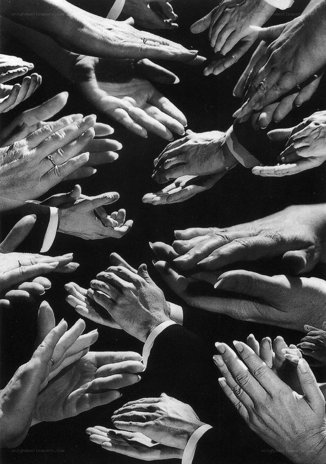Hands reaching in a circle