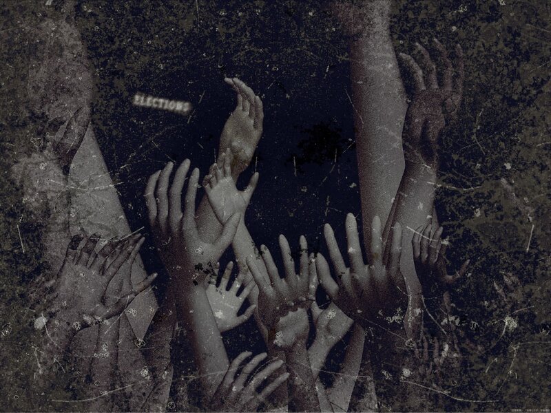 Hands reaching in dark