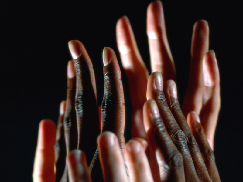 hands reaching upward