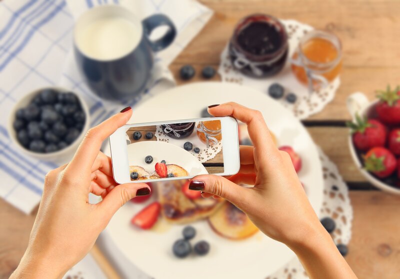Hands Taking a Photo