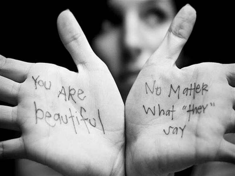 hands with affirming messages