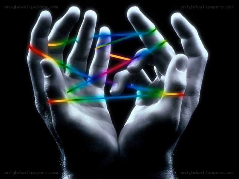hands with colorful light strings