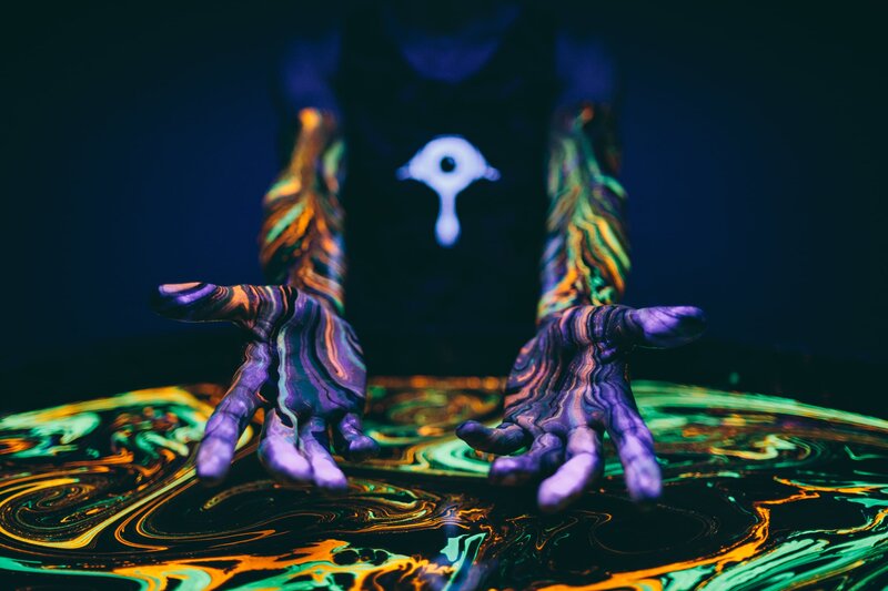 Hands with Glowing Paint