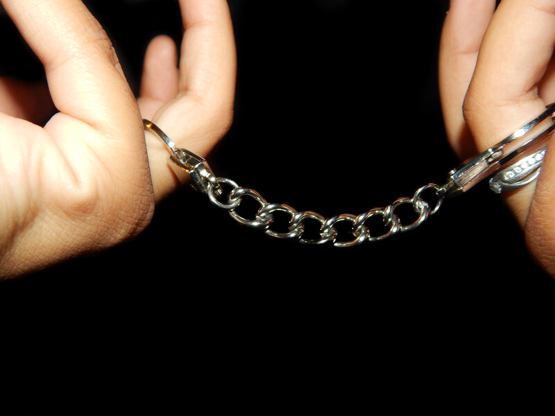 Hands with Handcuffs