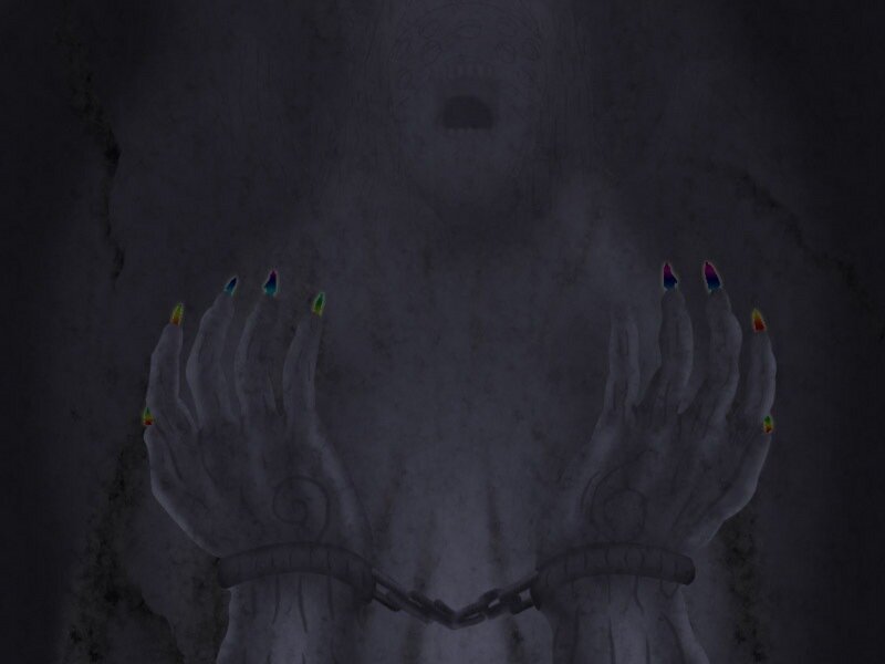 hands with rainbow nails in dark room