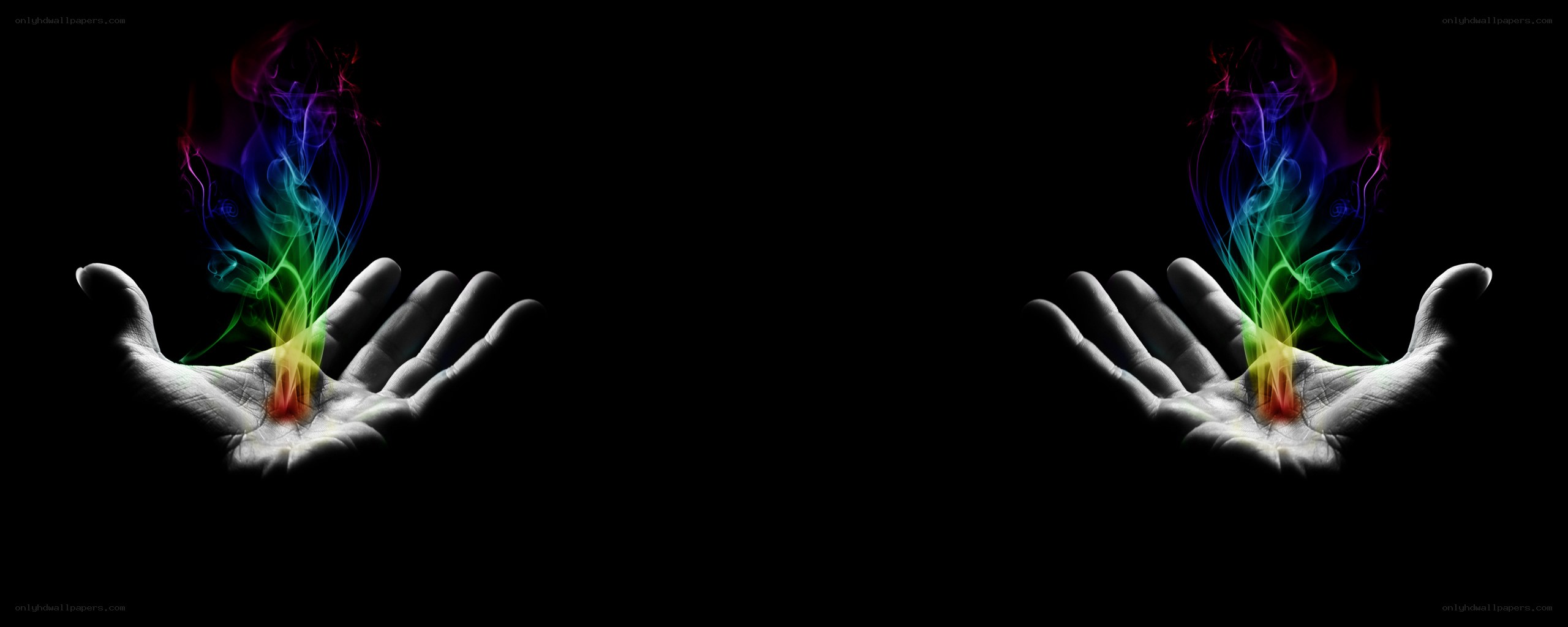 hands with rainbow smoke