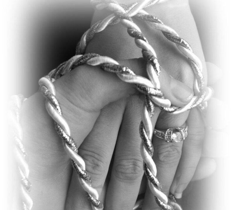 Hands with Rope and Ring
