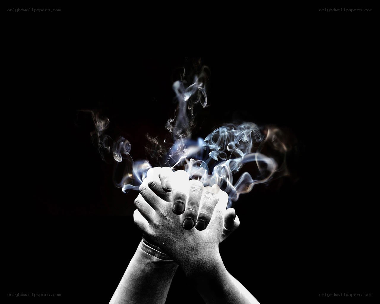 hands with smoke