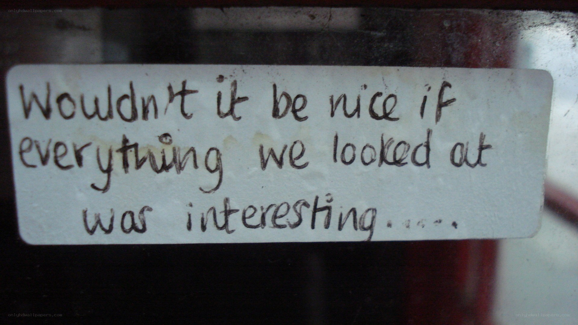 handwritten note on glass