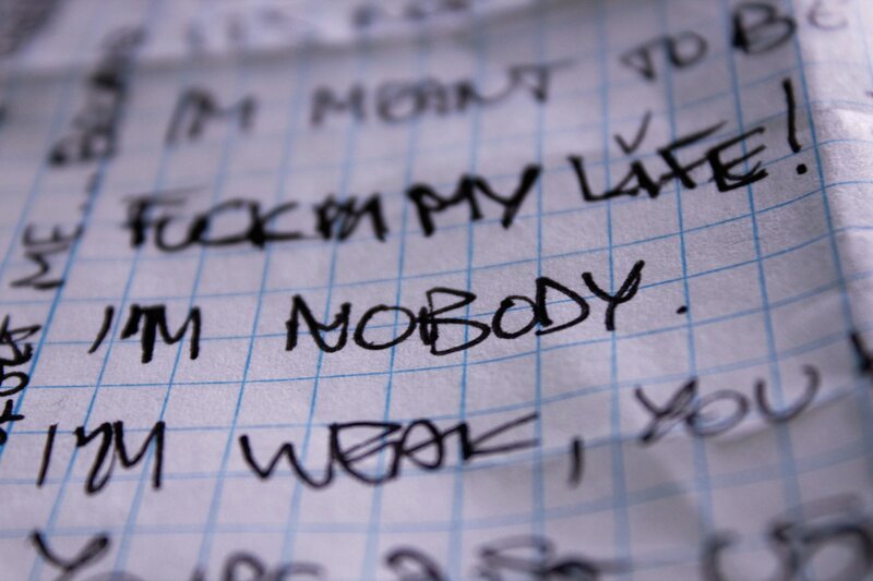 handwritten notes on grid paper