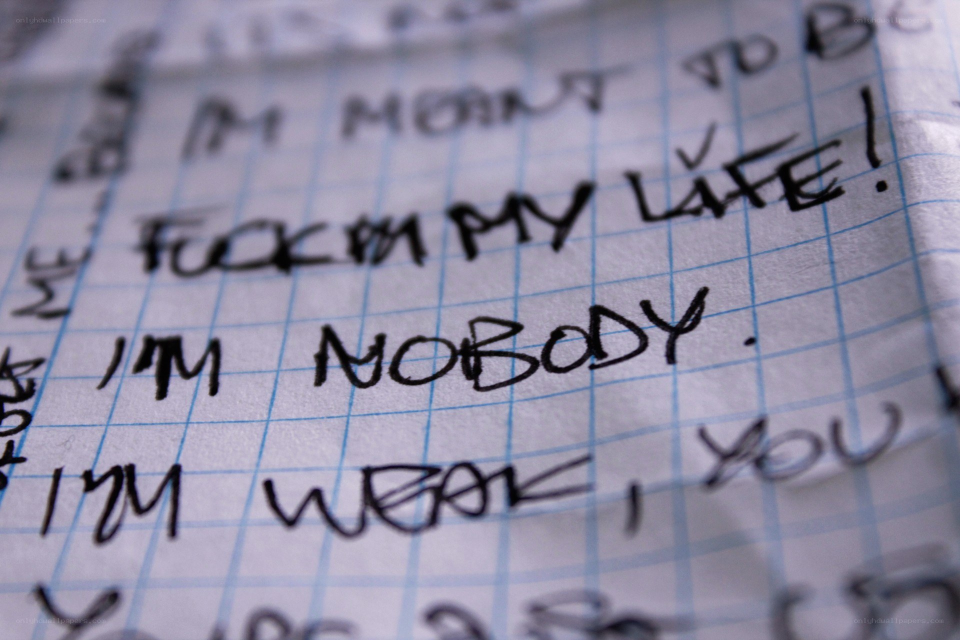 handwritten notes on grid paper
