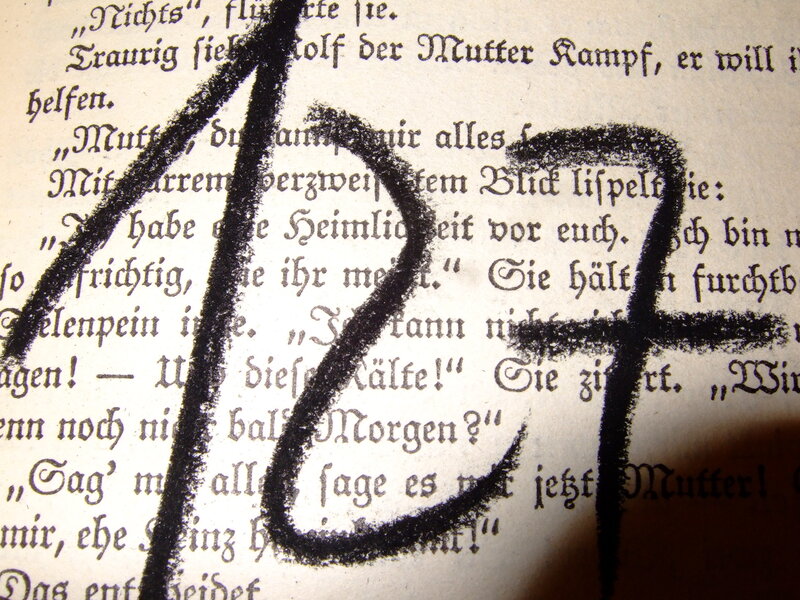 Handwritten number on book page