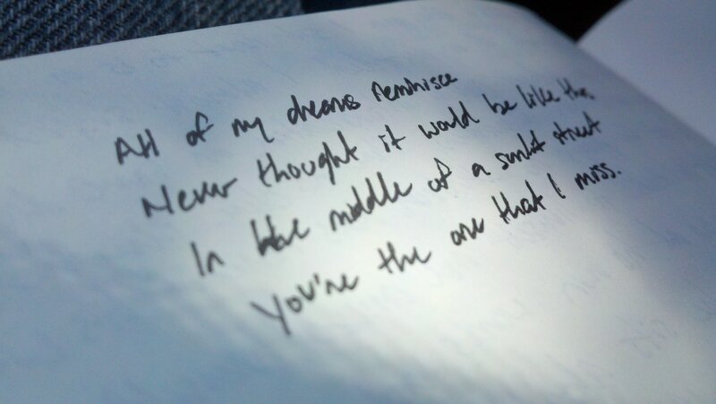 handwritten poem on paper