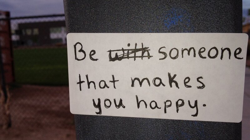 Handwritten Sign on Pole