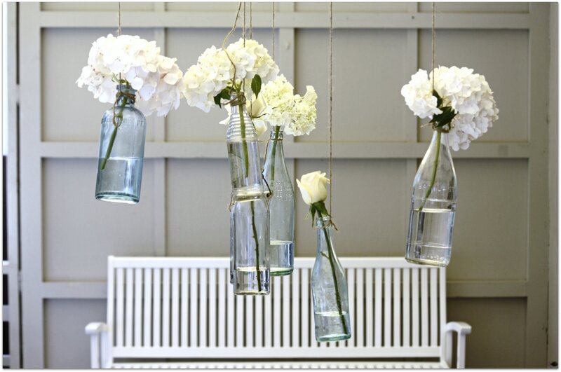 Hanging Glass Bottles with Flowers