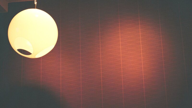 hanging lamp on patterned wall