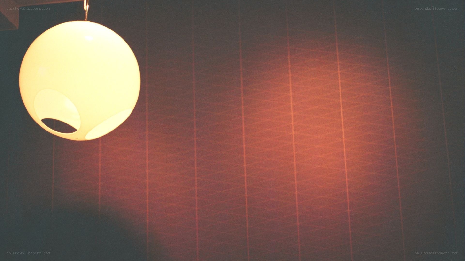 hanging lamp on patterned wall