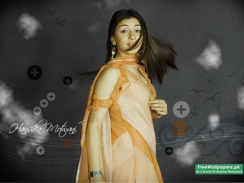 Hansika Motwani in orange saree