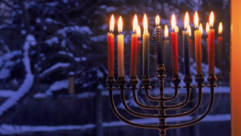 Hanukkah menorah with lit candles