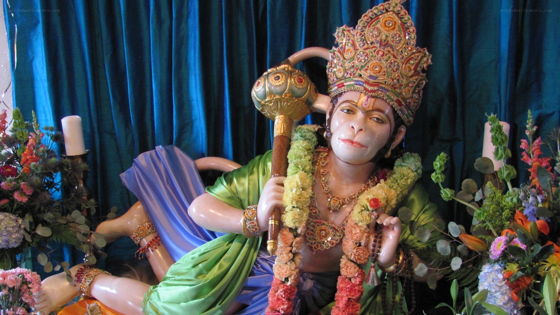 Hanuman statue with flowers