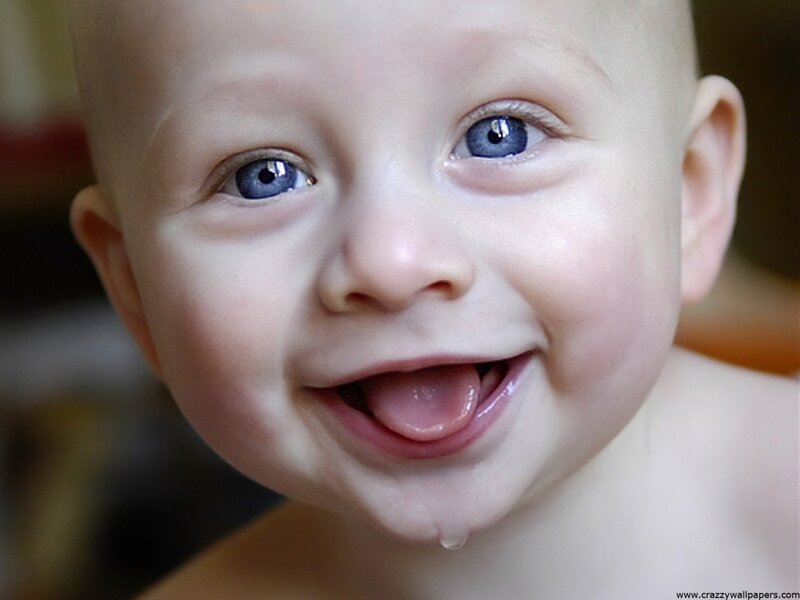 happy baby with blue eyes