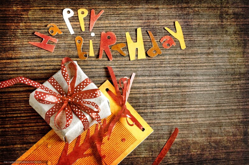 Happy birthday gift on wood