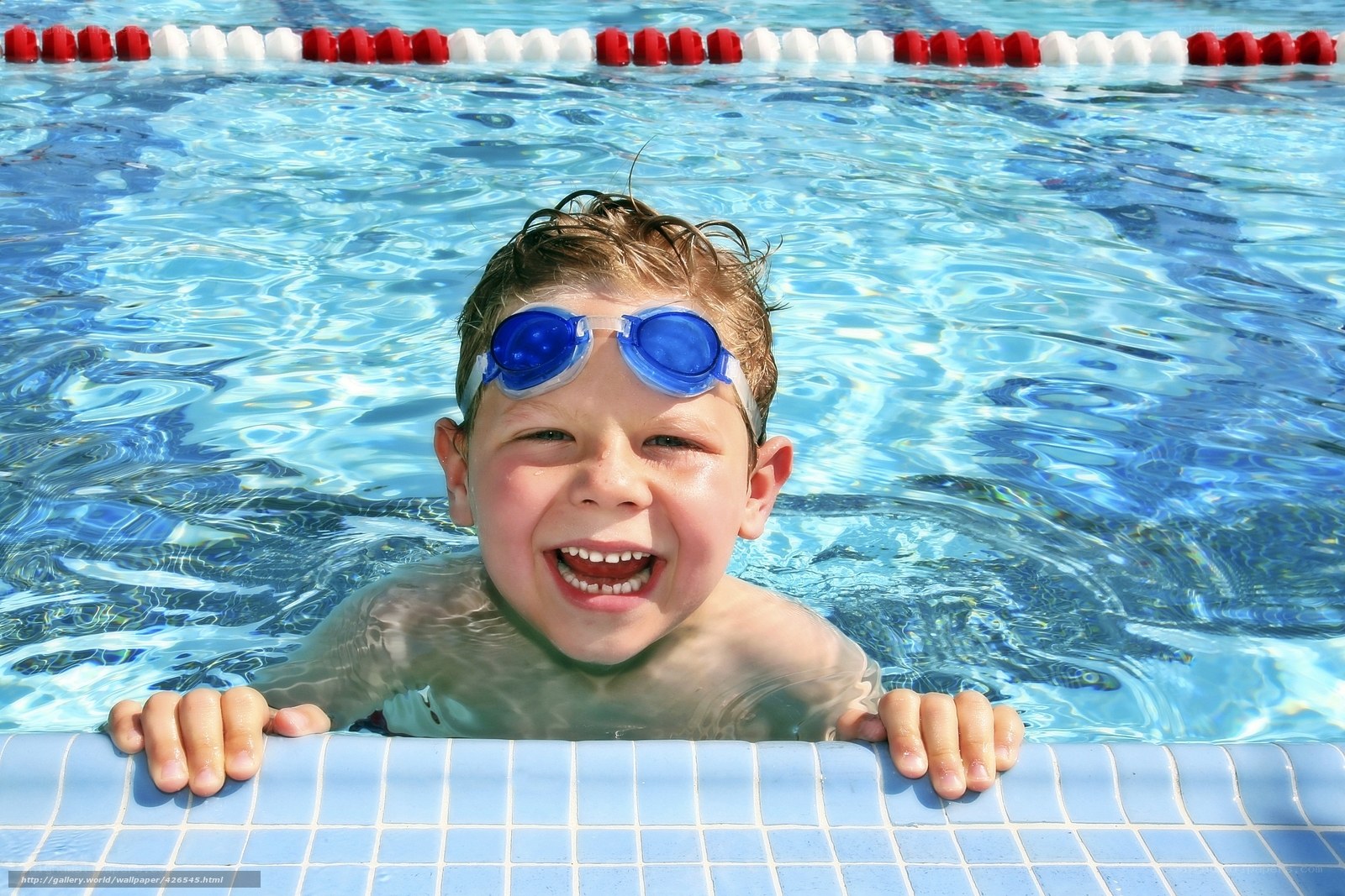 happy boy in swimming pool