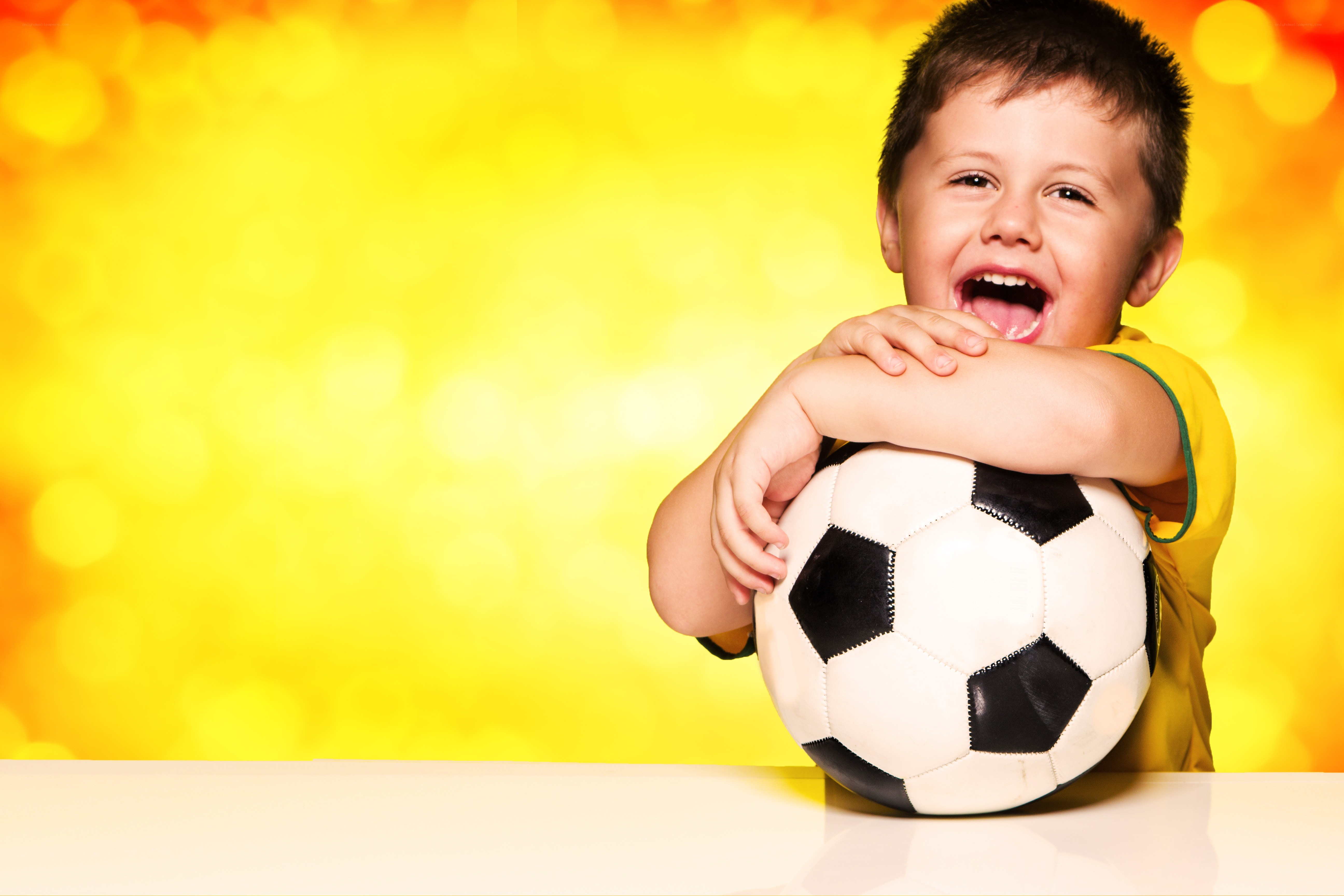 happy boy with soccer ball