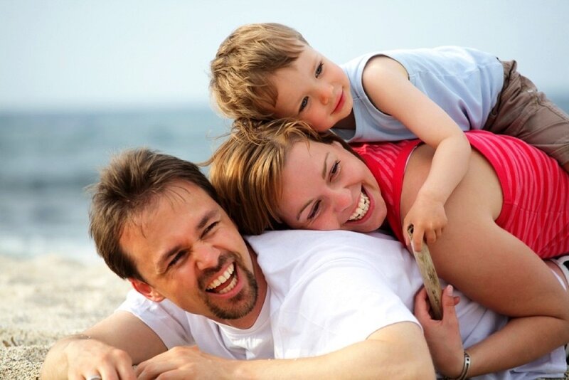 Happy family at the beach