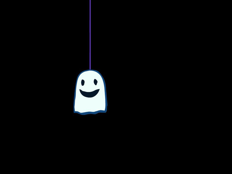happy ghost hanging from string