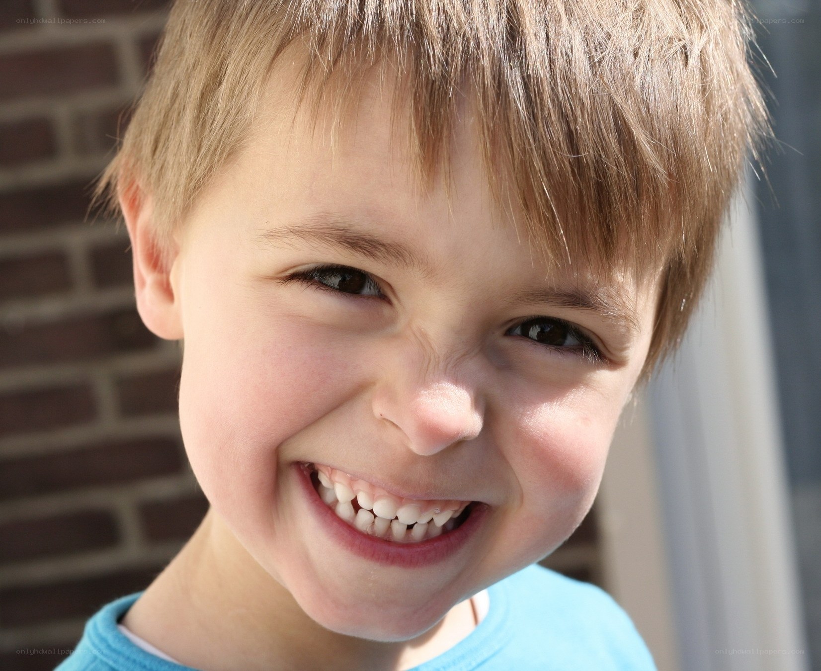 happy young boy smiling