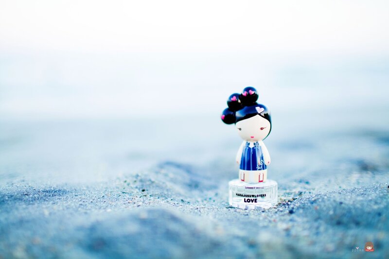 Harajuku Lovers figurine on sand