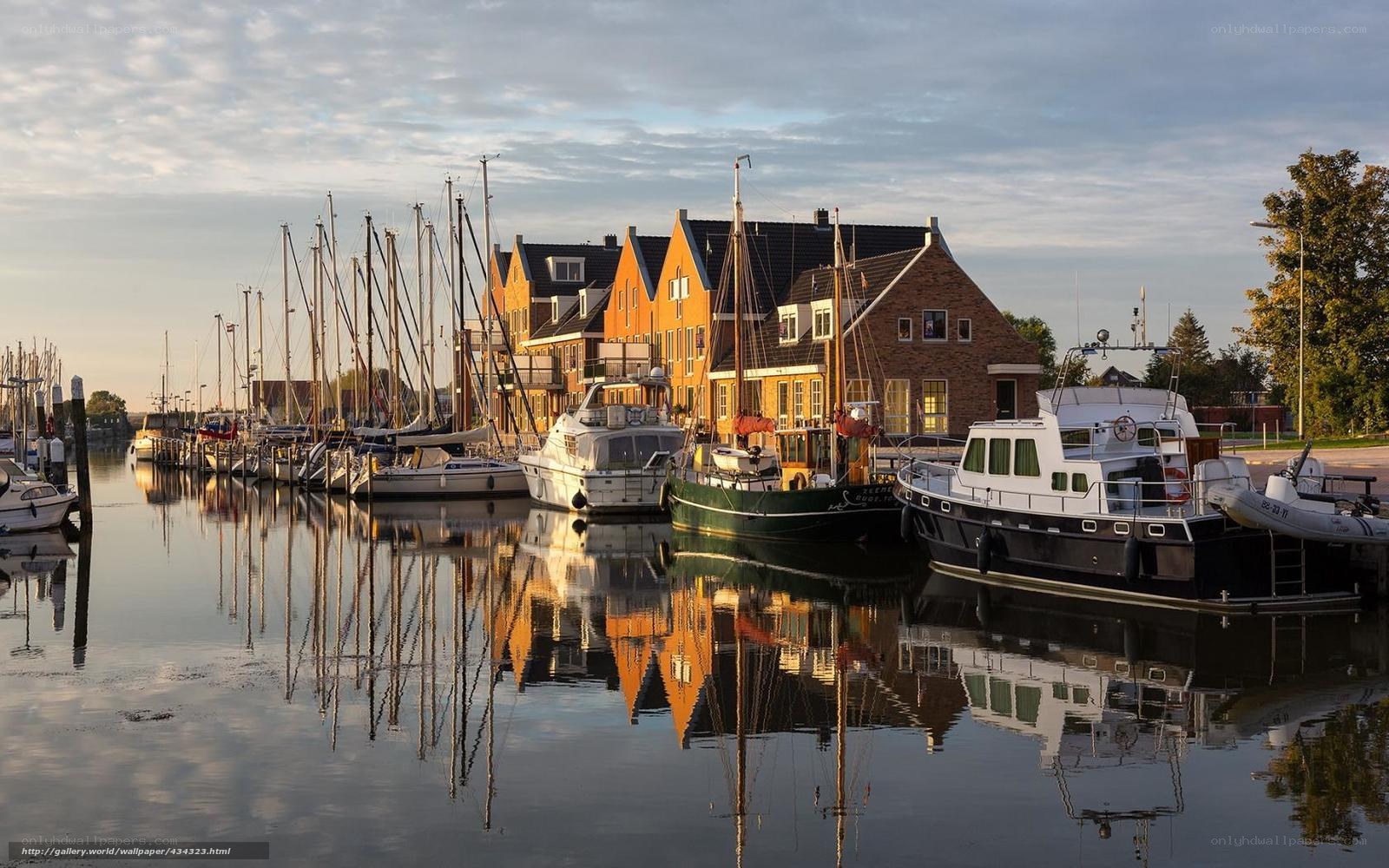Harbor at dawn with boats