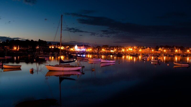 harbor at dusk with boats