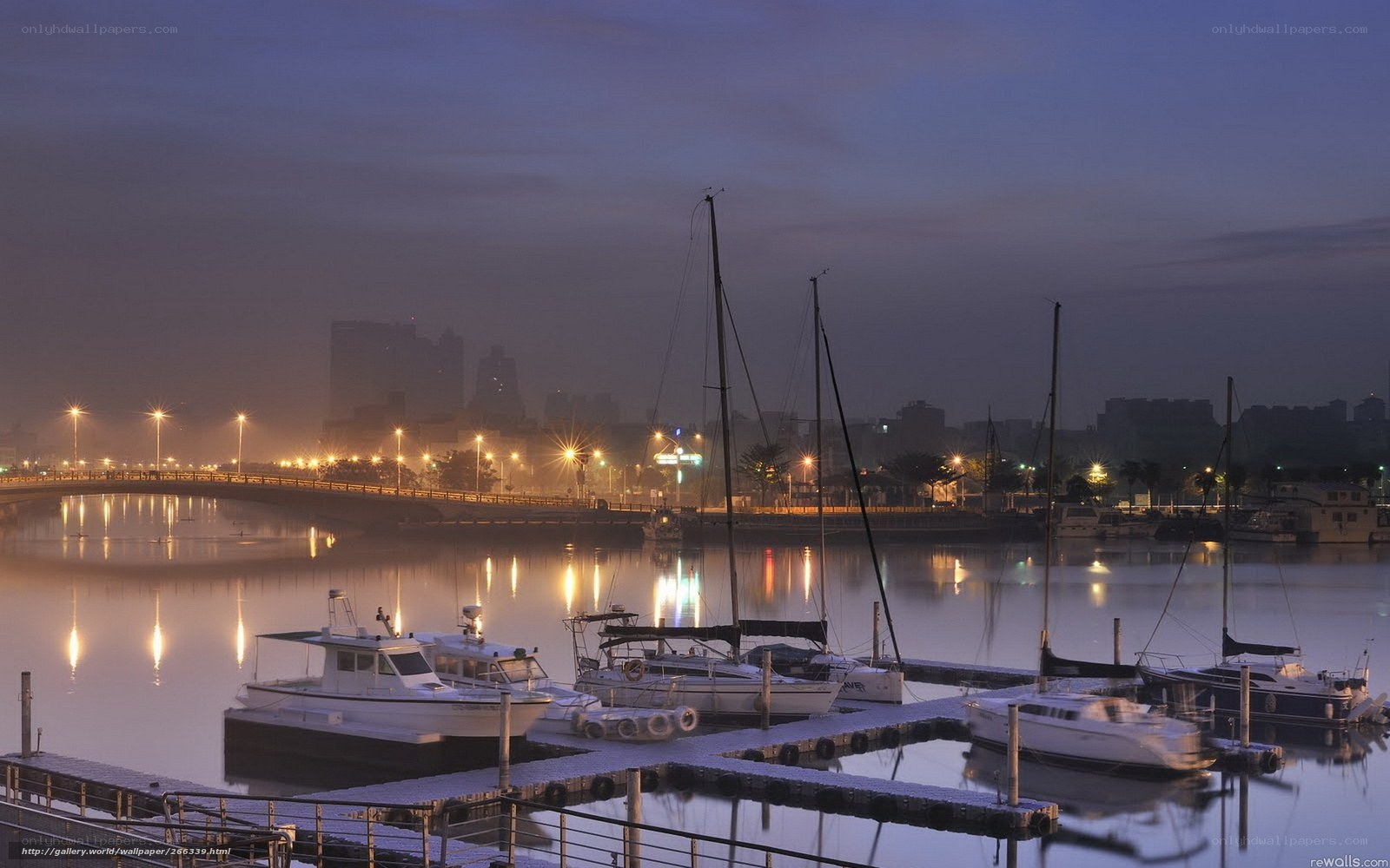 Harbor at Dusk with City Lights