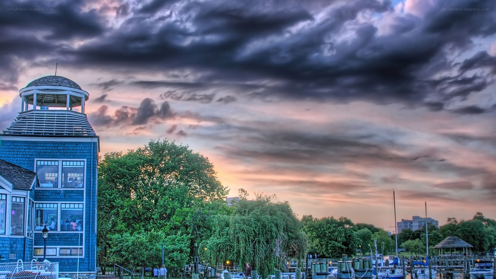 Harbor at dusk with stormy sky