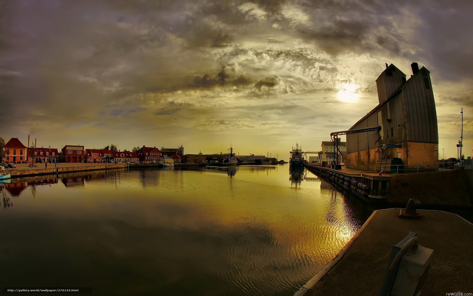 Harbor at sunset with grain silo