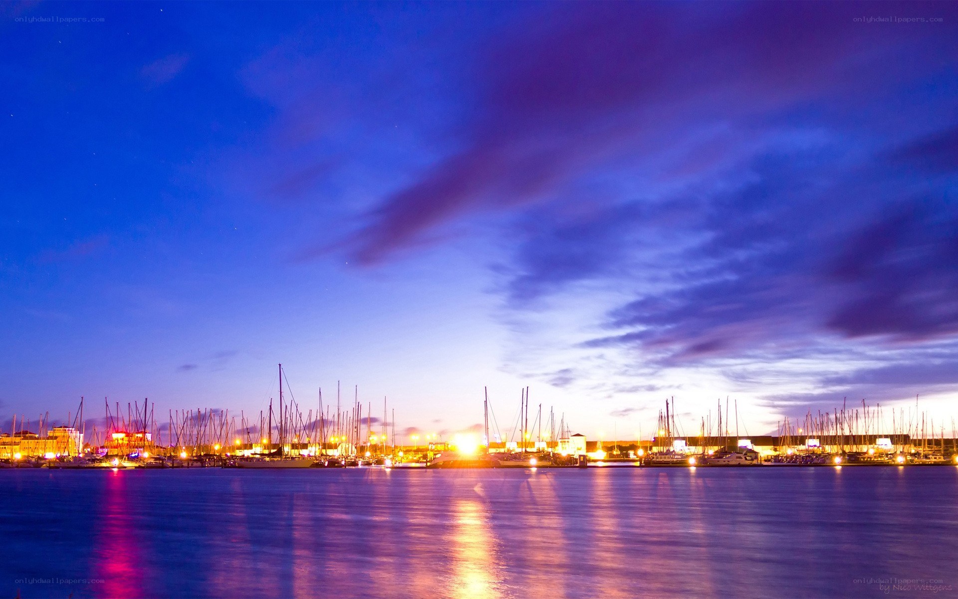 Harbor at twilight with boats