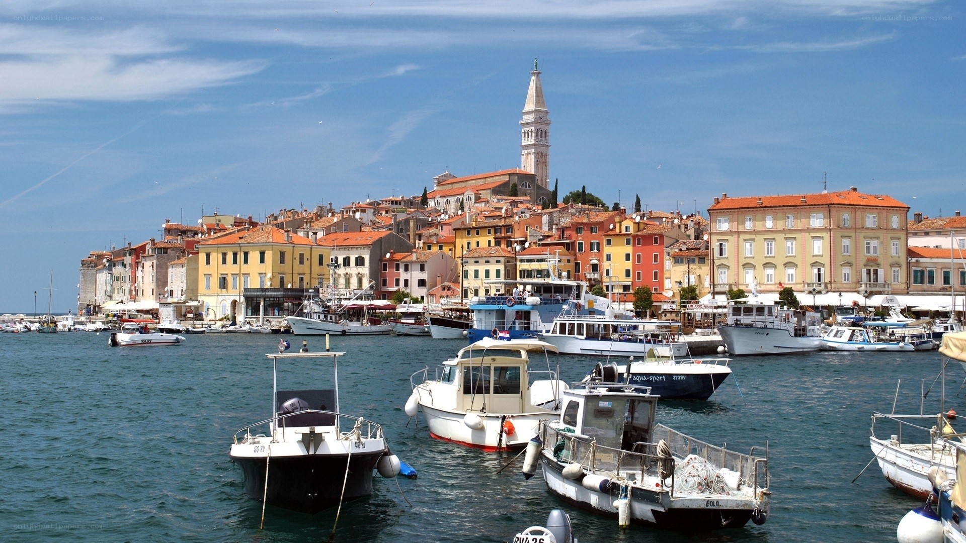 Harbor town with bell tower