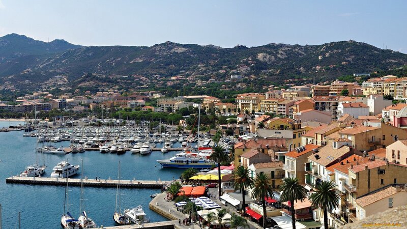 harbor town with mountains